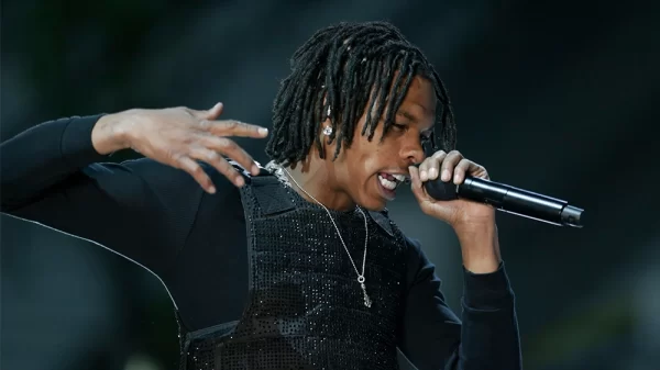 LiL Baby singing in a concert